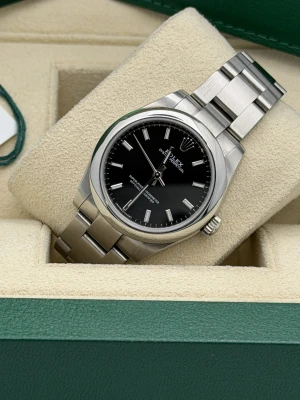 Rolex Oyster Perpetual 31mm oyster bracelet black baton dial 177200 (2019)