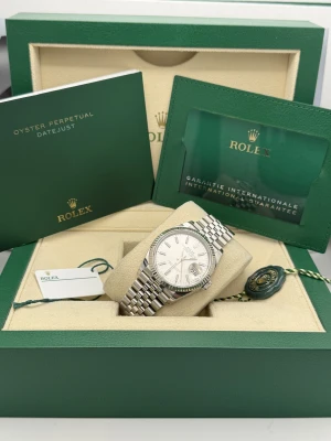 Rolex Datejust 36mm 123234 silver baton dial, jubilee, fluted bezel 2024