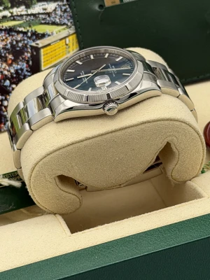 Rolex Oyster Perpetual date 34mm 115210 blue baton dial, engine turned bezel, oyster, 2008