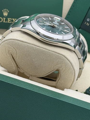 Rolex Datejust 41mm 126300 dial, mint green, smooth bezel, oyster, 2026 unworn