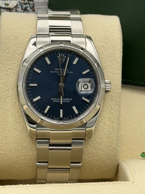Rolex Oyster Perpetual date 34mm 115210 blue baton dial, engine turned bezel, oyster, 2008