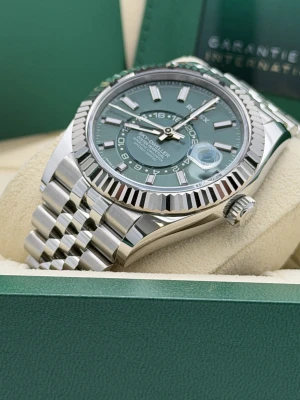 Rolex Sky-Dweller 42mm, 336934, mint green dial, white gold fluted bezel, stainless steel jubilee bracelet.2026 unworn
