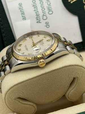 Rolex Datejust 36mm 16233 white arabic dial, yellow gold fluted bezel, bi metal jubilee bracelet