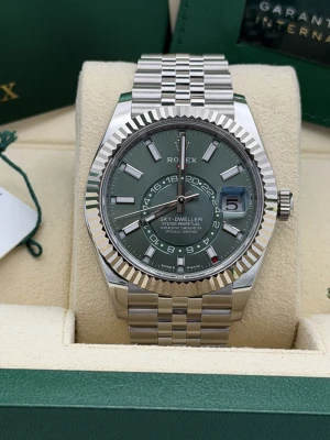 Rolex Sky-Dweller 42mm, 336934, mint green dial, white gold fluted bezel, stainless steel jubilee bracelet.2026 unworn