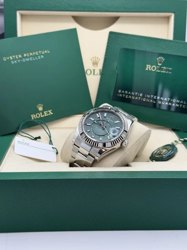Rolex Sky-Dweller 42mm, 336934 mint green dial, oyster bracelet, 2026 unworn
