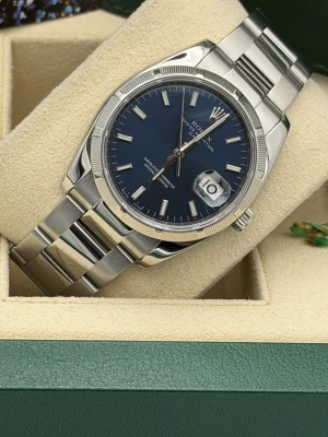 Rolex Oyster Perpetual date 34mm 115210 blue baton dial, engine turned bezel, oyster, 2008