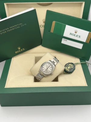 Rolex Oyster Perpetual 26mm oyster bracelet 176200 Silver Baton Dial 2017