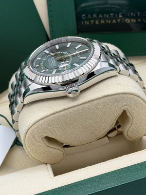 Rolex Sky-Dweller 42mm, 336934, mint green dial, white gold fluted bezel, stainless steel jubilee bracelet.2026 unworn
