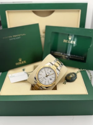 Rolex Datejust 41mm 126333 bi metal oyster white baton dial 2024