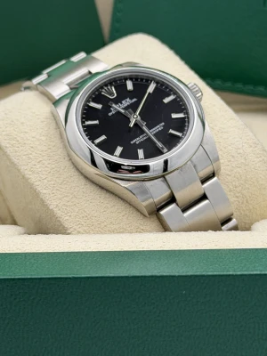 Rolex Oyster Perpetual 31mm oyster bracelet black baton dial 177200 (2019)