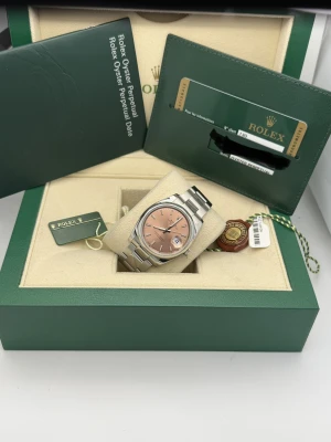 Rolex Oyster Perpetual Date 34mm Stainless Steel Oyster Bracelet 115200 2014