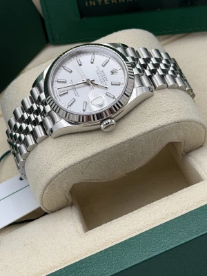 Rolex Datejust 36mm 123234 silver baton dial, jubilee, fluted bezel 2024