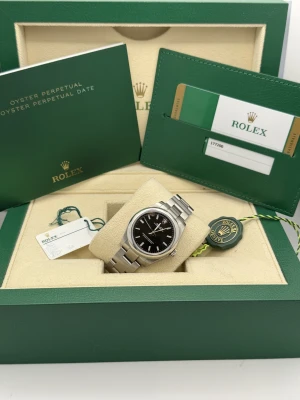 Rolex Oyster Perpetual 31mm oyster bracelet black baton dial 177200 (2019)
