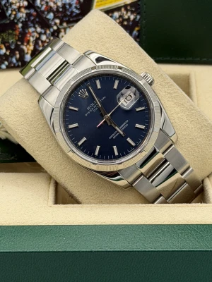 Rolex Oyster Perpetual date 34mm 115210 blue baton dial, engine turned bezel, oyster, 2008