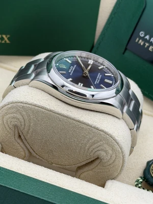 Rolex Oyster Perpetual 36mm blue baton dial oyster bracelet 126000 (2020)