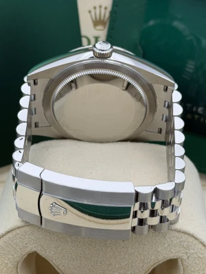 Rolex Sky-Dweller 42mm, 336934, mint green dial, white gold fluted bezel, stainless steel jubilee bracelet.2026 unworn