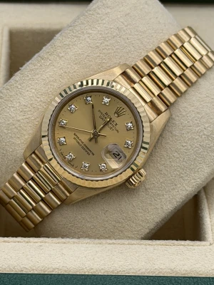 Rolex Datejust 26mm 69178 champagne dia dot dial, yellow gold case, fluted bezel and president bracelet 1996
