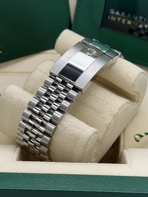 Rolex Sky-Dweller 42mm, 336934, mint green dial, white gold fluted bezel, stainless steel jubilee bracelet.2026 unworn