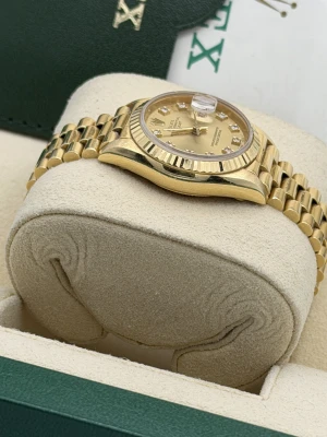 Rolex Datejust 26mm 69178 champagne dia dial, yellow, fluted bezel, president bracelet 1990